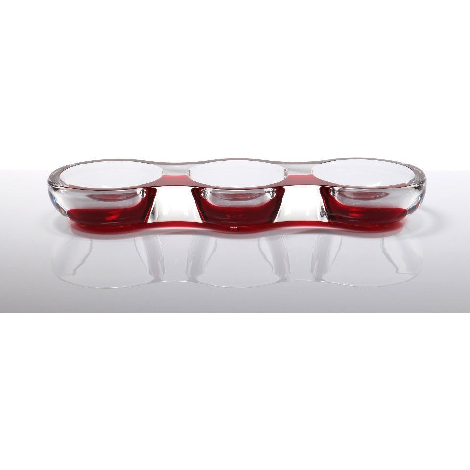 An acrylic tamarin bowl with a ruby red exterior and clear glass basins, designed for serving nuts, candy, or as a decorative centerpiece.