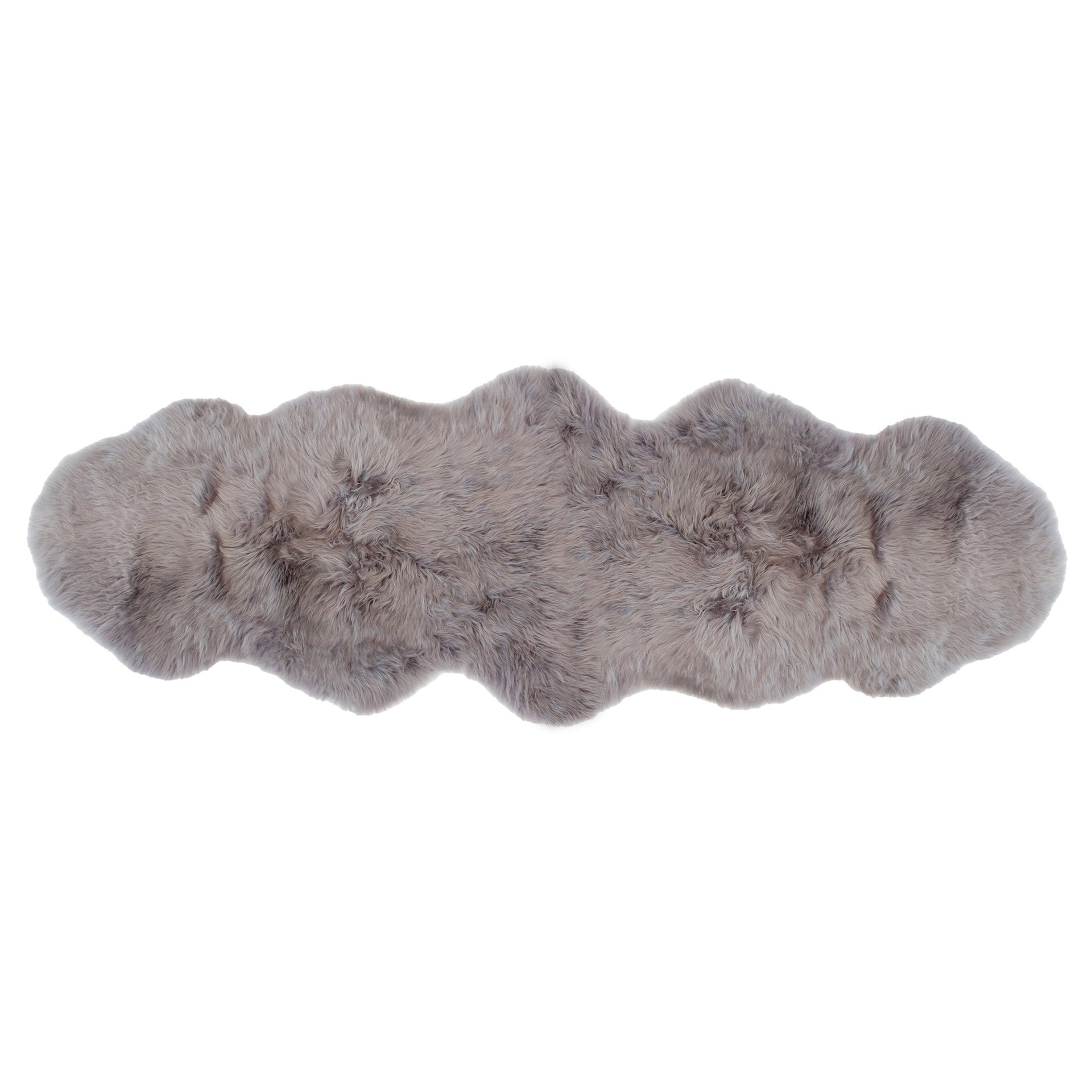 A premium sheepskin rug with a beige and white color, displayed on a white background.