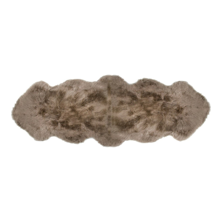 A taupe-colored longwool sheepkin rug with a double pelt texture.