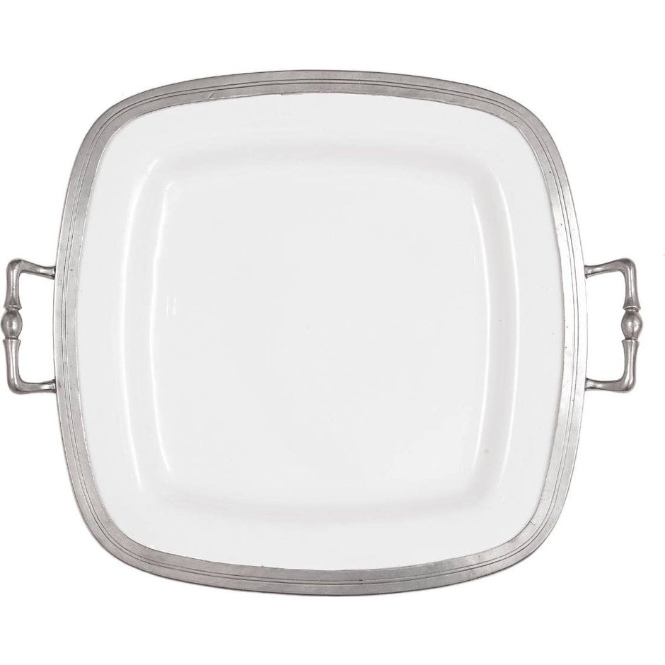 A square ceramic platter with handles, featuring a bianco white ceramic surface with pewter accents and a patina finish.