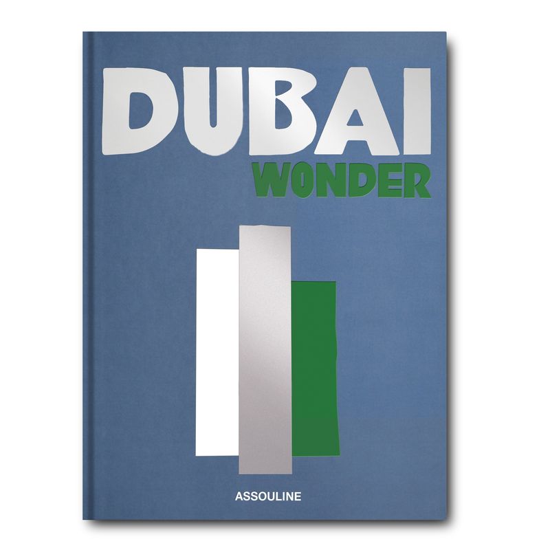 Book cover of 'Dubai Wonder' by Assouline with a blue background and colorful text.