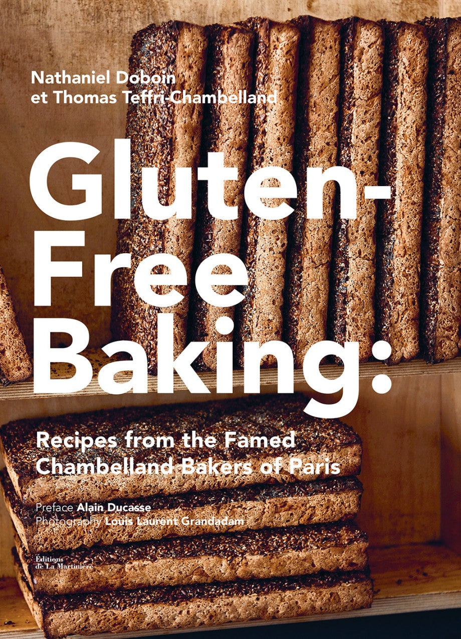 Book cover of 'Gluten-Free Baking' with baked goods on a wooden shelf.