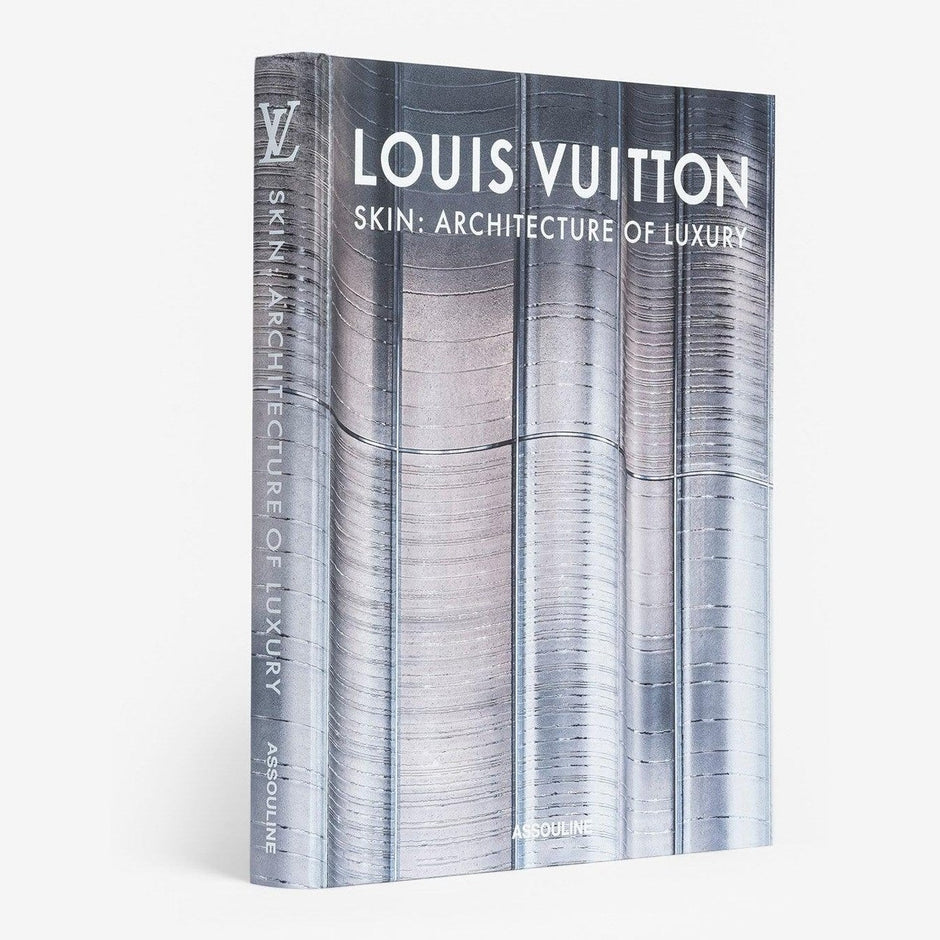 A book cover featuring the title 'Louis Vuitton Skin: Architecture of Luxury' with a metallic, reflective image of a building facade.
