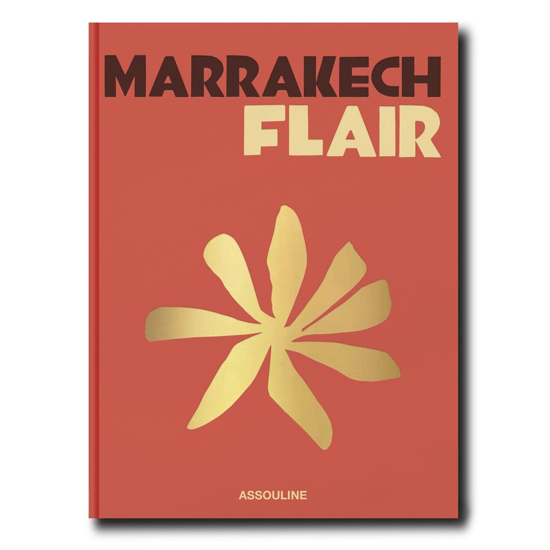 Book cover of 'Marrakech Flair' with gold floral design on a red background