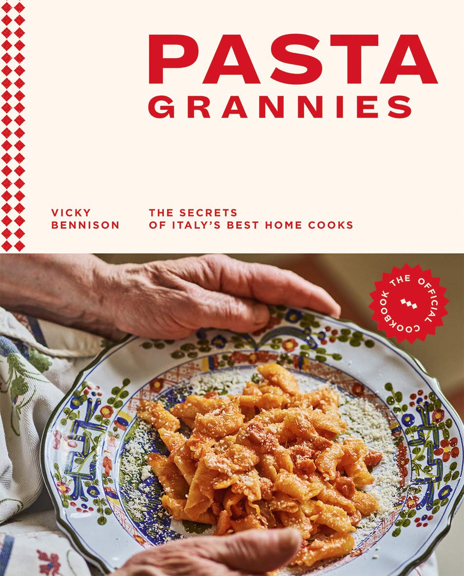 Book cover of 'Pasta Grannies' with a hand holding a plate of pasta.