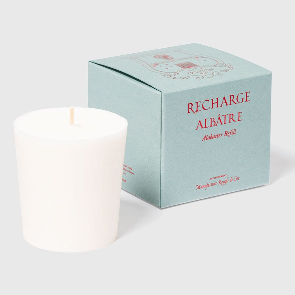 A Trudon Alabaster candle refill in a white container, displayed in front of its blue packaging box with 'RECHARGE ALBÀTRE Alabaster Refill' text.