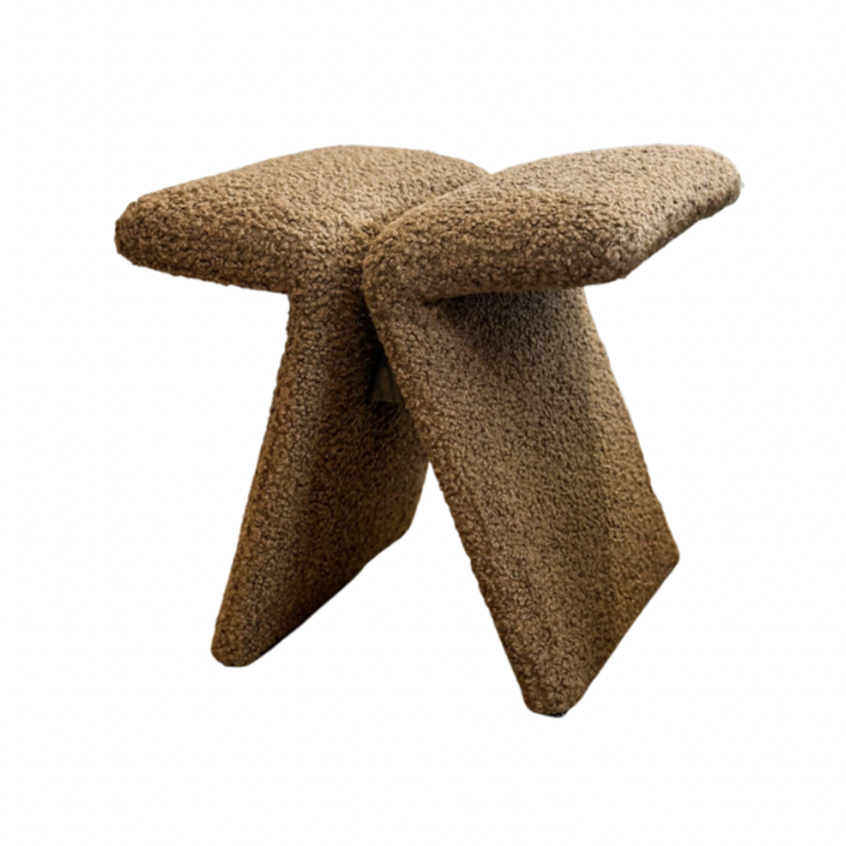 A brown upholstered Verellen Butterfly Stool with a unique curved V-shaped structure, designed for seating.
