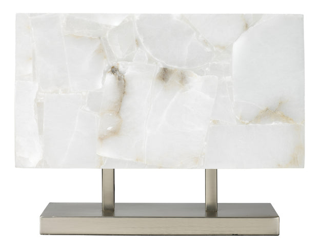 Marble-patterned table lamp with metallic base on a white background