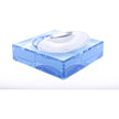 A white aluminum bowl liner fitted into a blue acrylic candy bowl, designed to protect the bowl from scratches.