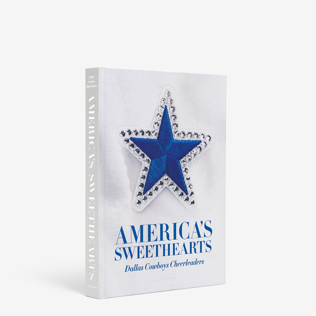 Assouline America's Sweethearts Dallas Cowboys Cheerleaders decor book showing a classic cover with cheerleader photos.