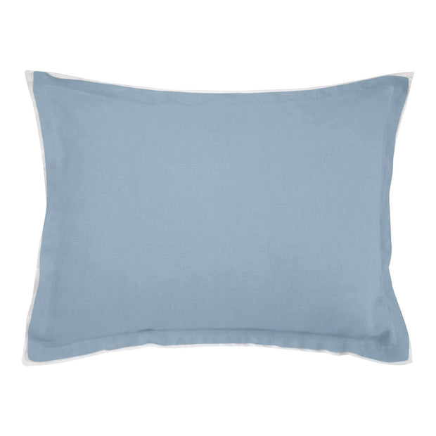A blue linen pillow sham with a silk flange, front made from Belgian flax linen and the back made from natural linen.