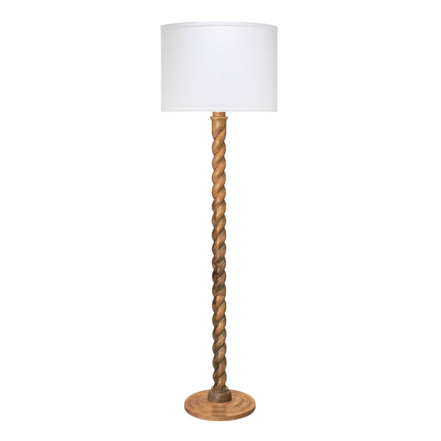 A floor lamp with a white drum shade, a twisted wooden central stem, and a round wooden base, shown against a plain white background.
