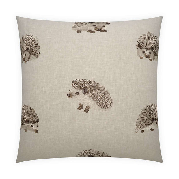 A square-shaped throw pillow with a beige background featuring a pattern of hedgehog designs.