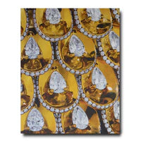 Book with a cover featuring Patterned fabric with a yellow background and decorative elements