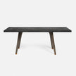 A rectangular dining table with a dark stained oak base and a zinc tabletop.
