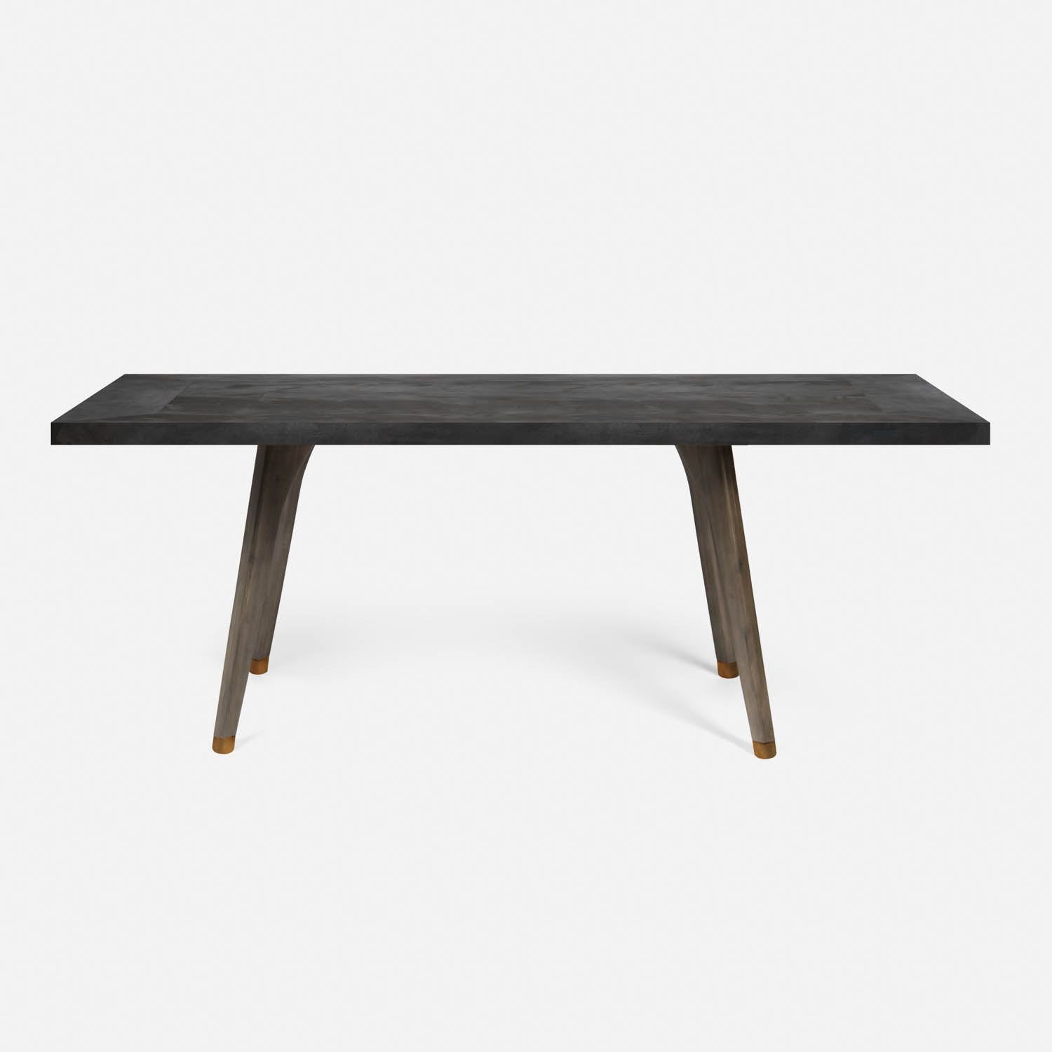 A rectangular dining table with a dark stained oak base and a zinc tabletop.