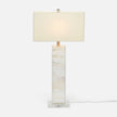 A tall, rectangular, white table lamp with a light mother-of-pearl finish and a natural linen shade.