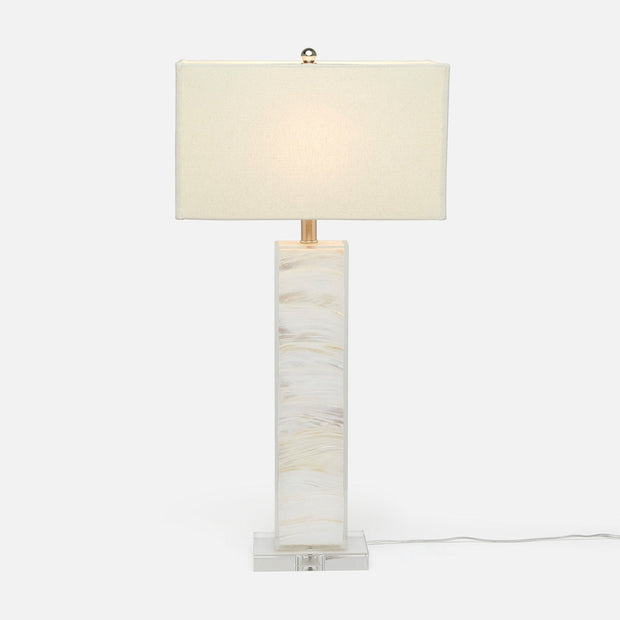 A tall, rectangular, white table lamp with a light mother-of-pearl finish and a natural linen shade.
