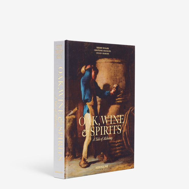 Assouline decor book titled "Oak, Wine and Spirits: A Tale of Alchemy" featuring a classic cover with oak and wine-themed design.