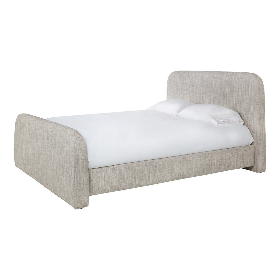 A beige upholstered king-sized bed frame with a rounded headboard and footboard, displayed with white bedding.