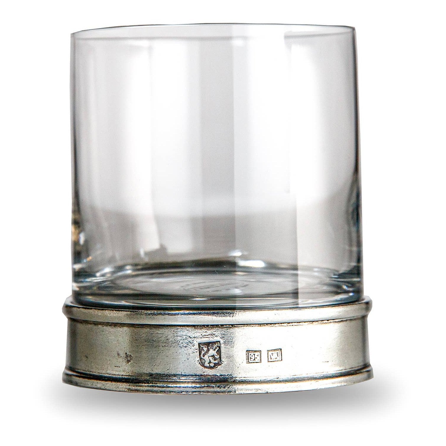 A clear round glass lowball glass with a pewter base, featuring the Arte Italica logo, hand made in Italy.