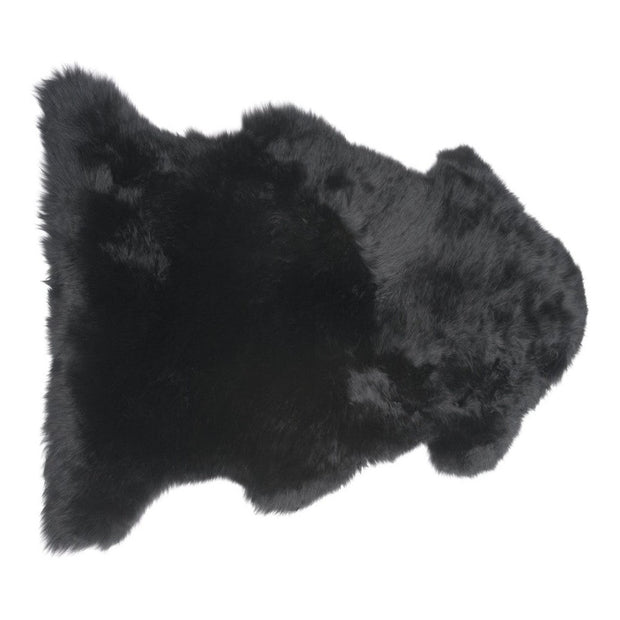 A single longwool black sheepskin rug.