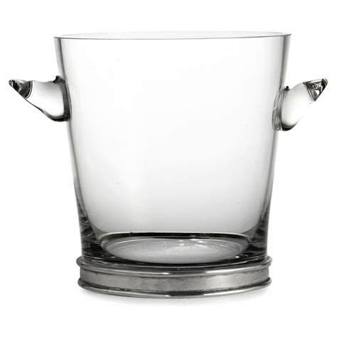A clear glass ice bucket with pewter handles and base.