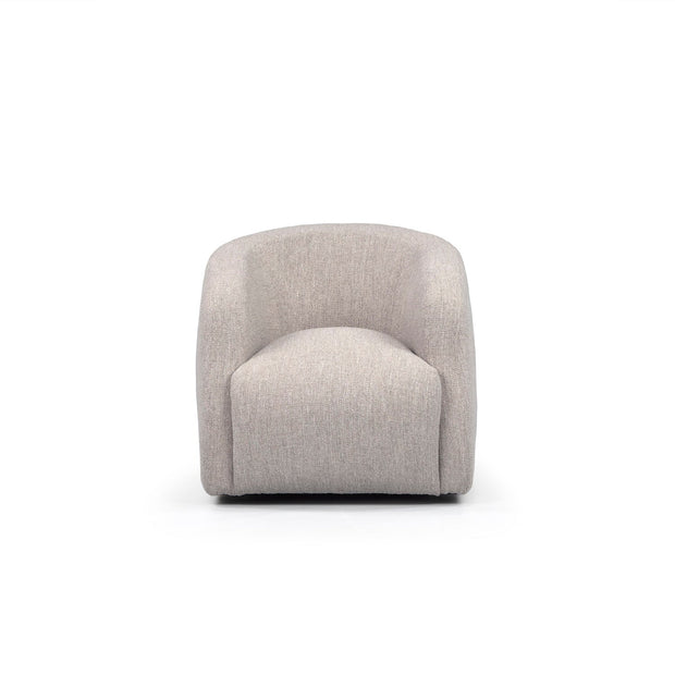 A beige upholstered Theo Club Swivel Chair with a curved backrest and a 22” swivel base, displayed against a white background.