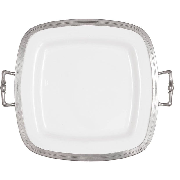 A square ceramic platter with handles, featuring a bianco white ceramic surface with pewter accents and a patina finish.