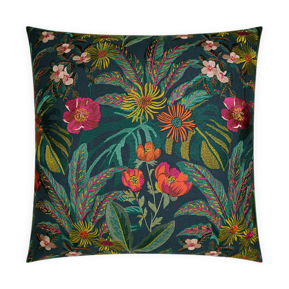 Decorative pillow with colorful floral pattern on a dark green background
