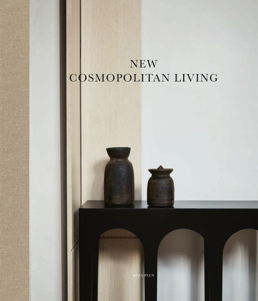 Decor book titled "New Cosmopolitan Living" by ACC Publishing, featuring interior design inspiration and modern decor ideas.