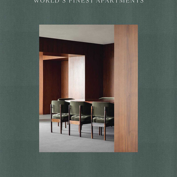 Decor book titled "World's Finest Apartments" by ACC Publishing showcasing luxury apartment interior designs.