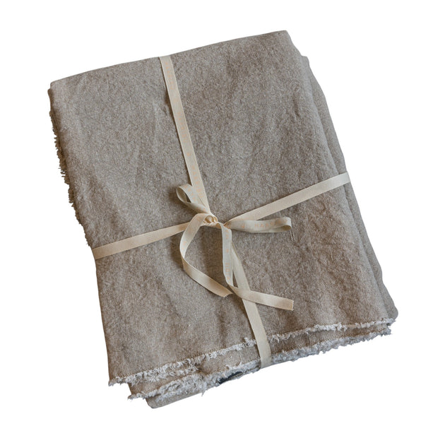 Queen-sized Adelene Chalk Coverlet with Husk design, featuring soft fabric and decorative stitching.