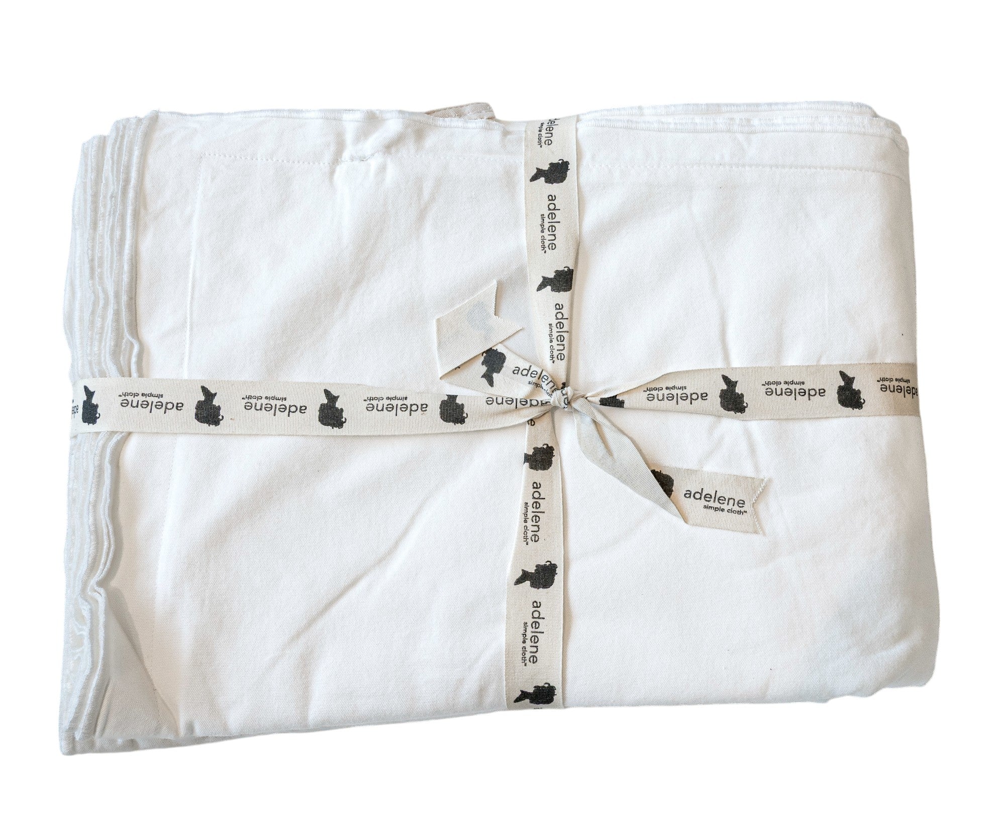 Adelene Kinfolk Queen duvet cover in bleached off-white fabric with subtle woven texture for a cozy, modern bedroom look.