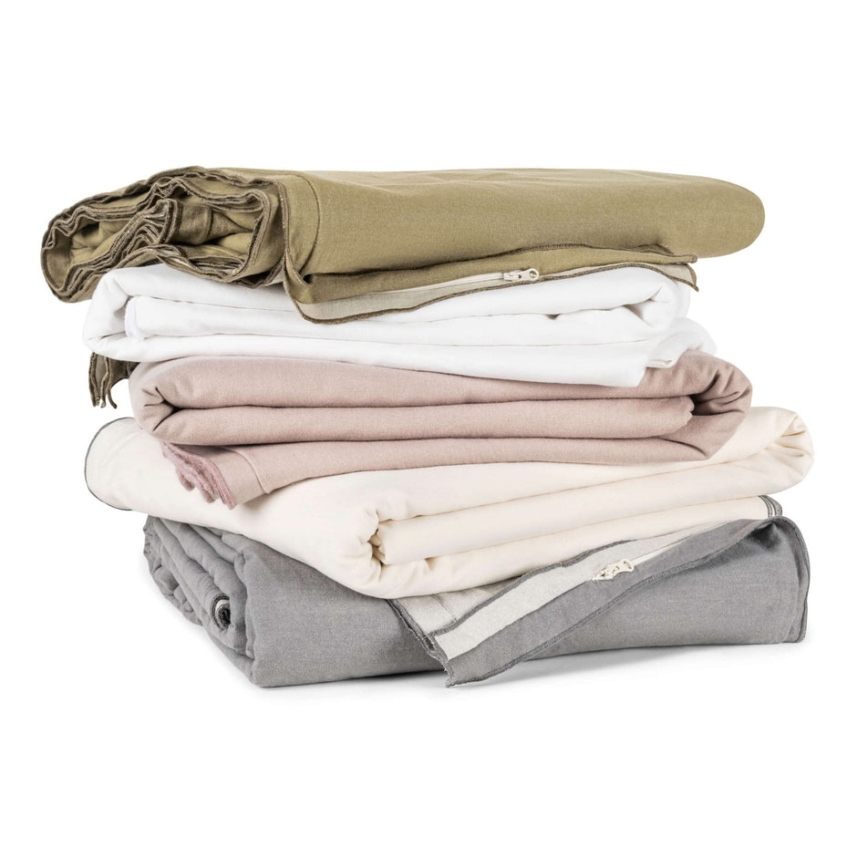 Adelene Kinfolk Queen duvet cover in porcelain with a subtle, textured design, made from soft, high-quality fabric.