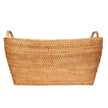 Honey brown rattan everything basket with hoop handles by Artifacts Trading Company, featuring a sturdy woven design and rounded shape.