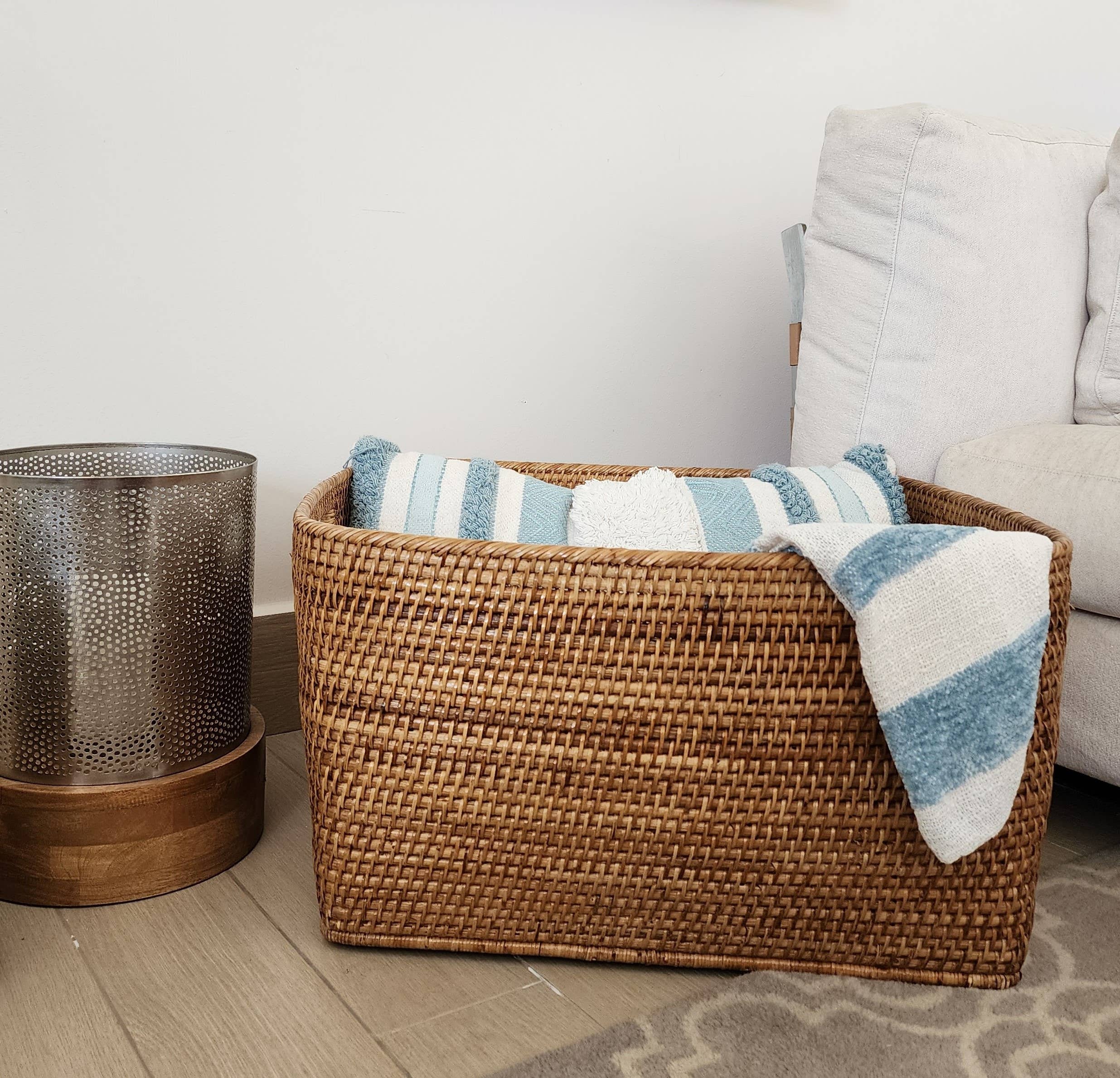 Artifacts Rattan Saboga family basket with cutout handle, woven rattan storage basket for home organization.
