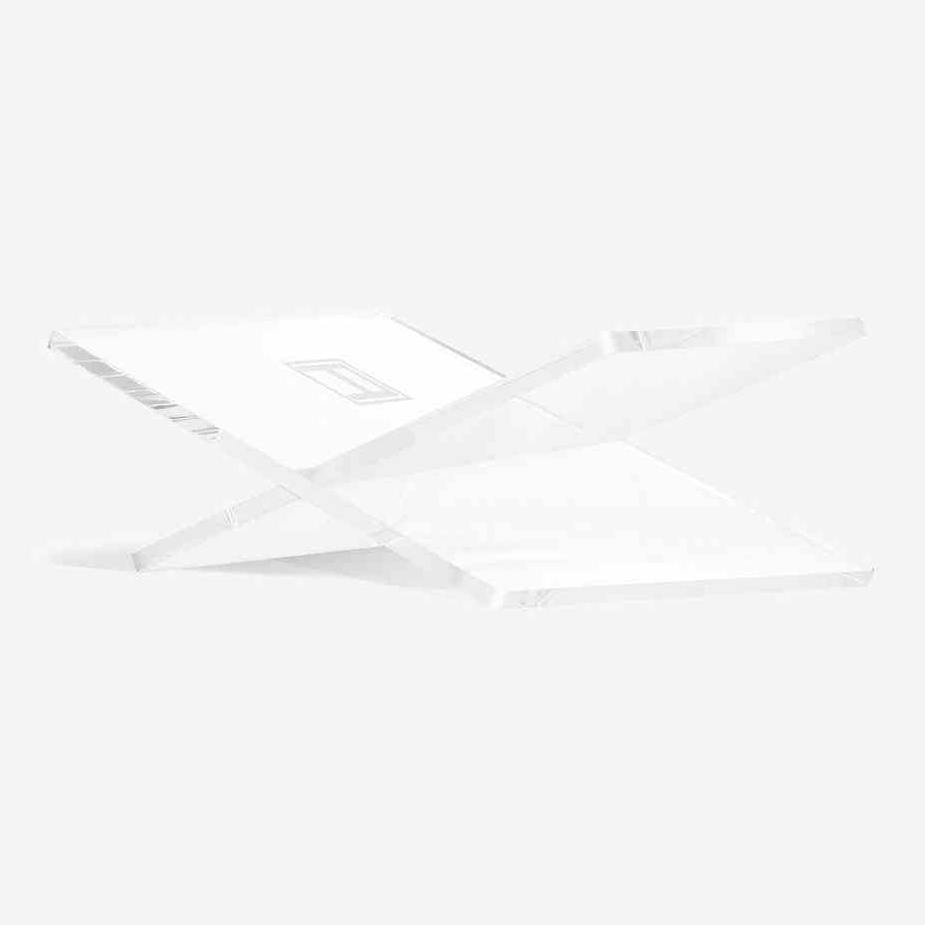 Assouline acrylic decor bookstand displaying a stylish book with clear, modern design for elegant home or office decor.