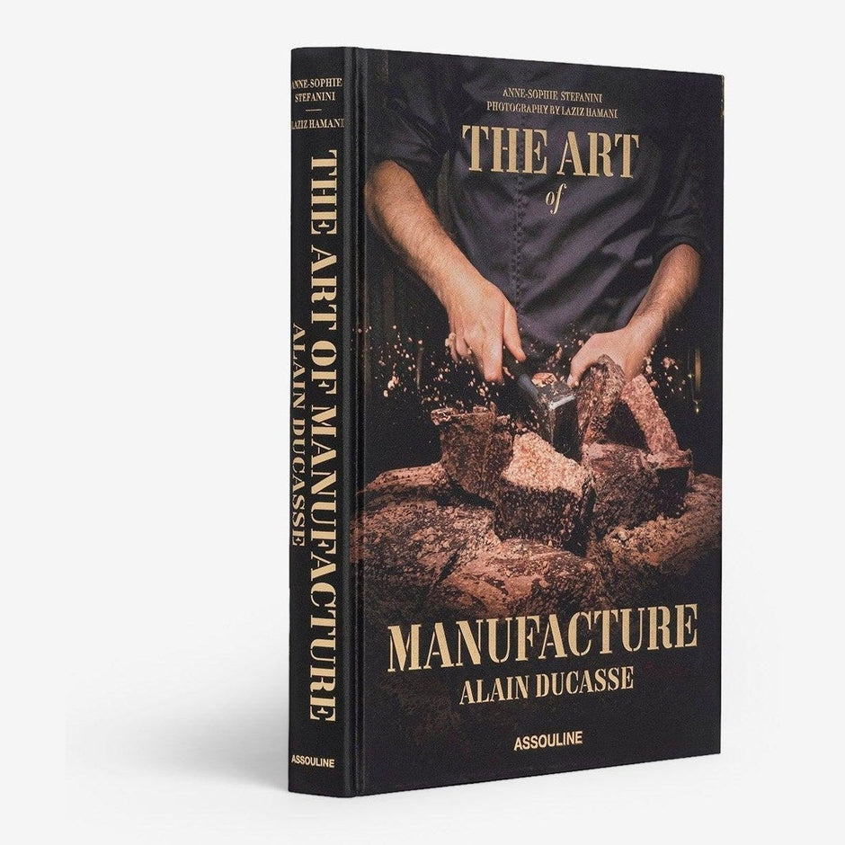 Assouline Art of Manufacture decor book featuring Alain Ducasse, showcasing elegant design and craftsmanship on the cover.