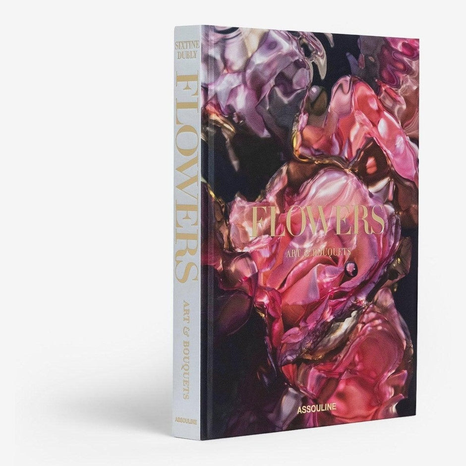 Assouline Flowers: Art & Bouquets decor book featuring vibrant flower illustrations and elegant bouquet designs.