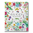 Assouline Gucci The Art of Silk decor book with silk-inspired cover, showcasing luxurious textile designs and elegant craftsmanship.