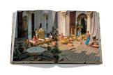 Assouline James Bond Destinations decor book featuring scenic locations and travel inspiration, displayed on a shelf.