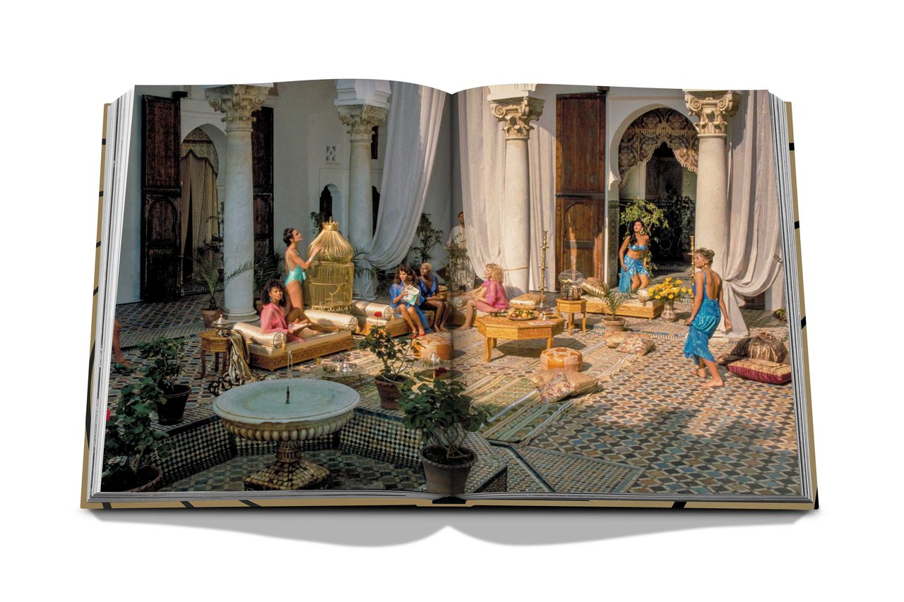 Assouline James Bond Destinations decor book featuring scenic locations and travel inspiration, displayed on a shelf.
