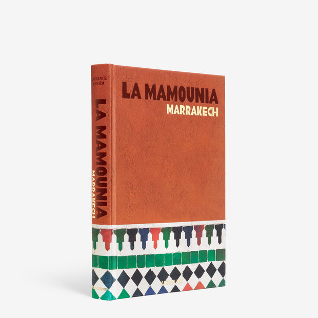 Assouline La Mamounia Marrakech decor book featuring luxurious images of the historic Moroccan hotel and interior designs.