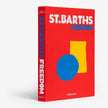 Assouline St Barths Freedom decor book featuring elegant cover design with images of St Barths scenery and interior decor.