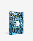 Assouline Street Art Icons decor book open pages featuring vibrant street art images and iconic urban artwork.