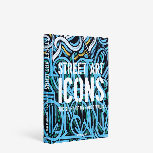 Assouline Street Art Icons decor book open pages featuring vibrant street art images and iconic urban artwork.