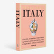 Assouline Wine & Travel Italy decor book with elegant cover design, showcasing Italian wine and travel themes.