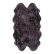 Black Quarto Longwool Sheepskin Rug by Auskin, plush sheepskin with a rich blackberry color and soft, natural wool texture.