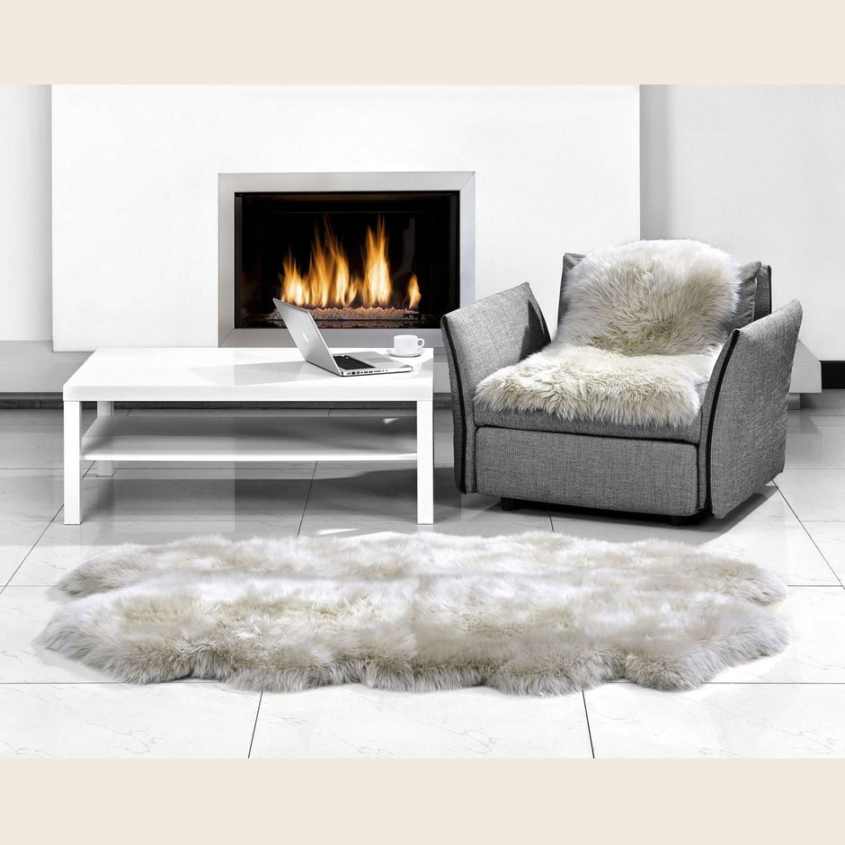Black Quarto Longwool Sheepskin Rug by Auskin featuring soft, luxurious sheepskin with a rich blackberry color and natural texture.